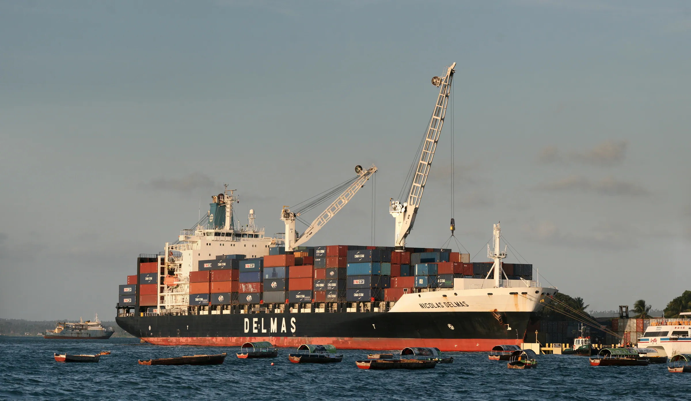 Container vessel at port — export logistics